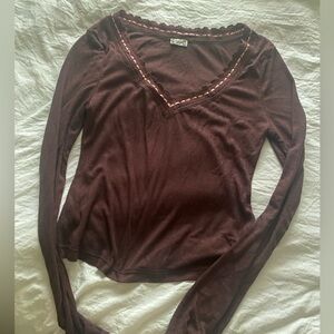 never worn, no tags - free people only you long sleeve, brown with pink ribbon